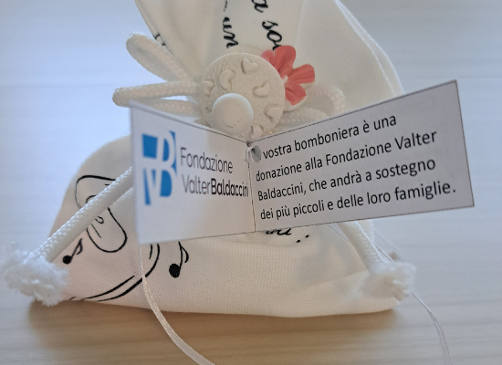 Celebration of Miriam's baptism with an act of generosity to the Valter Baldaccini Foundation